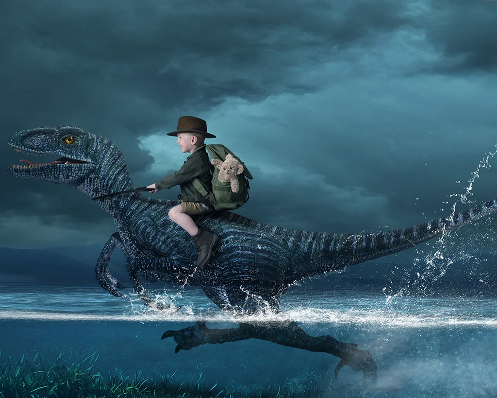 Boy Riding an Dinosaur running through water